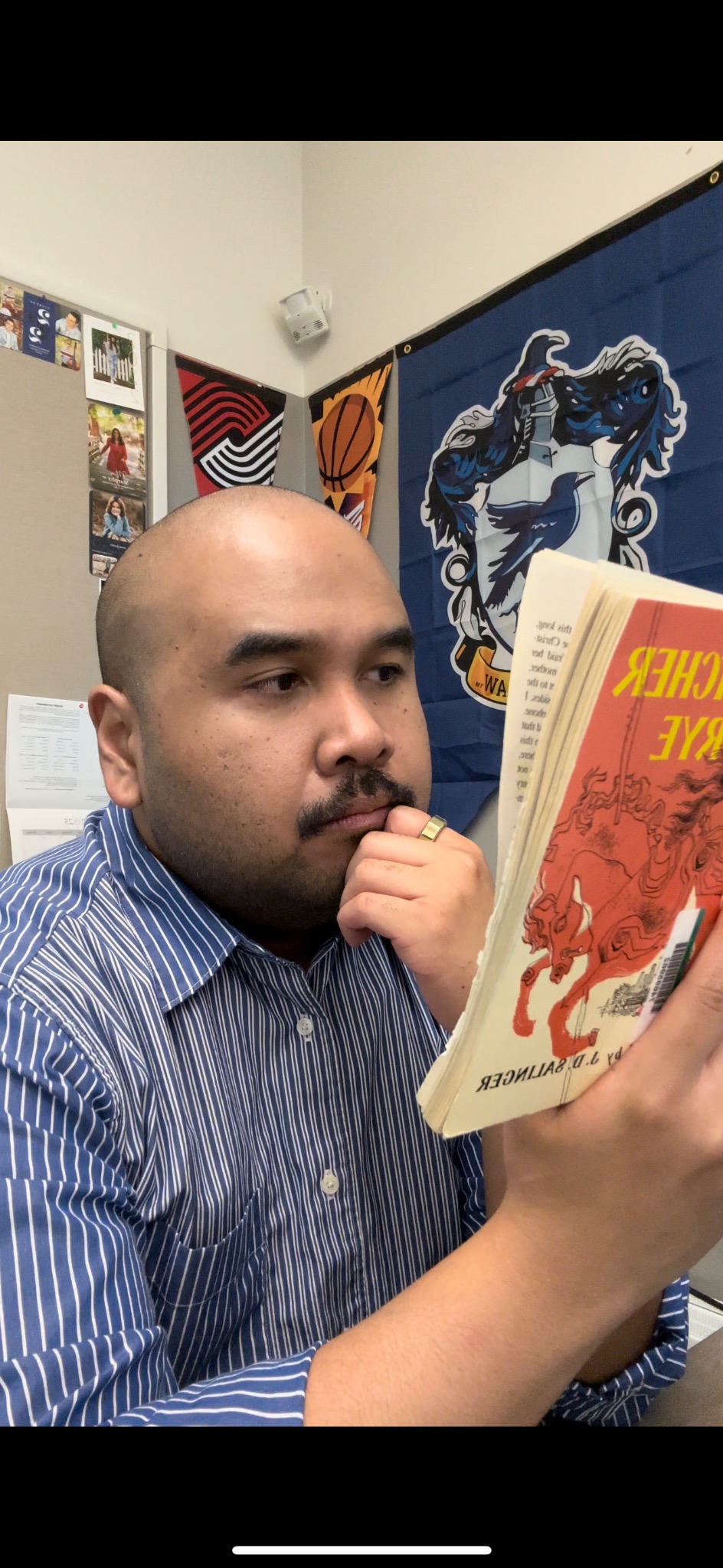 Kevin Boringot reading a book